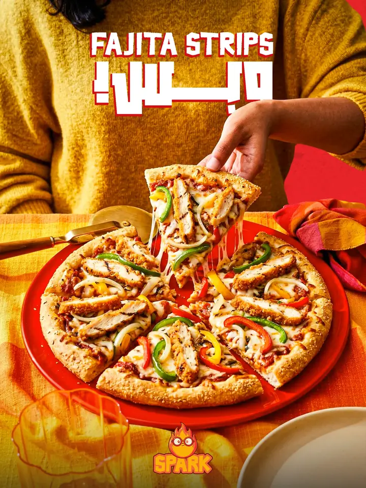 New product ad: chicken fajita pizza with a hand lifting a slice and long cheese strands