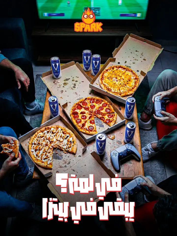 Social post for a pizza restaurant: overhead shot of pizza boxes, drinks and friends holding game controllers